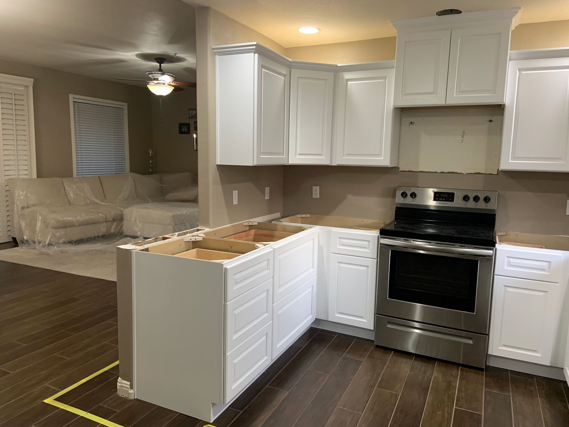 White custom kitchen cabinets installed by Mirage Marble & Granite